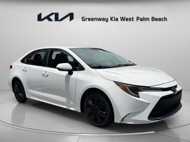 Used 2024 White Toyota LE image 1