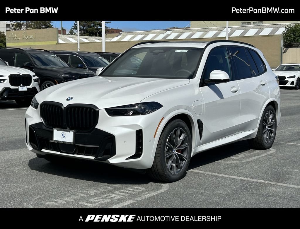 New 2026 Mineral White Metallic BMW xDrive50e image 1