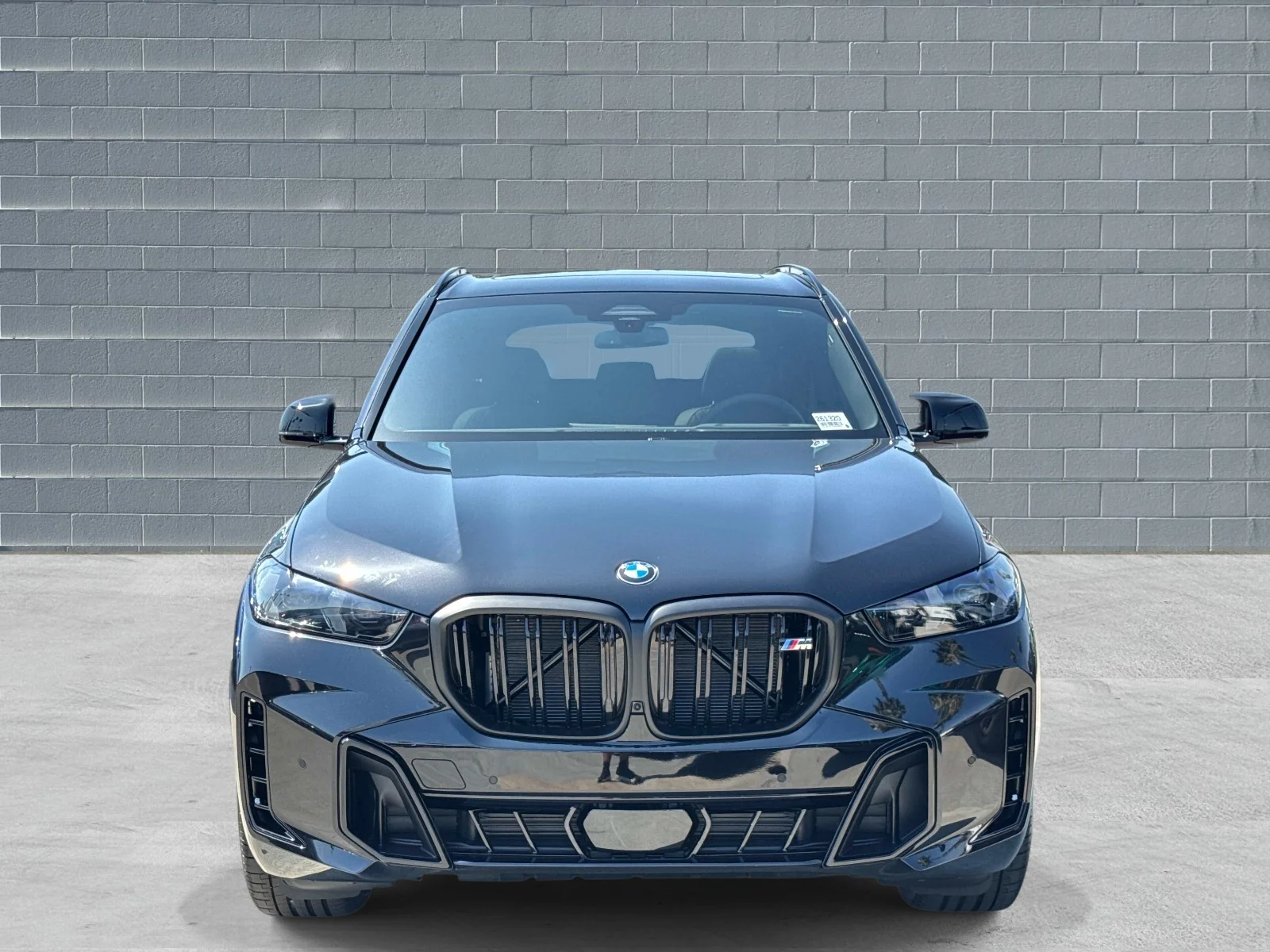 New 2026 Black Sapphire Metallic BMW M60i image 2