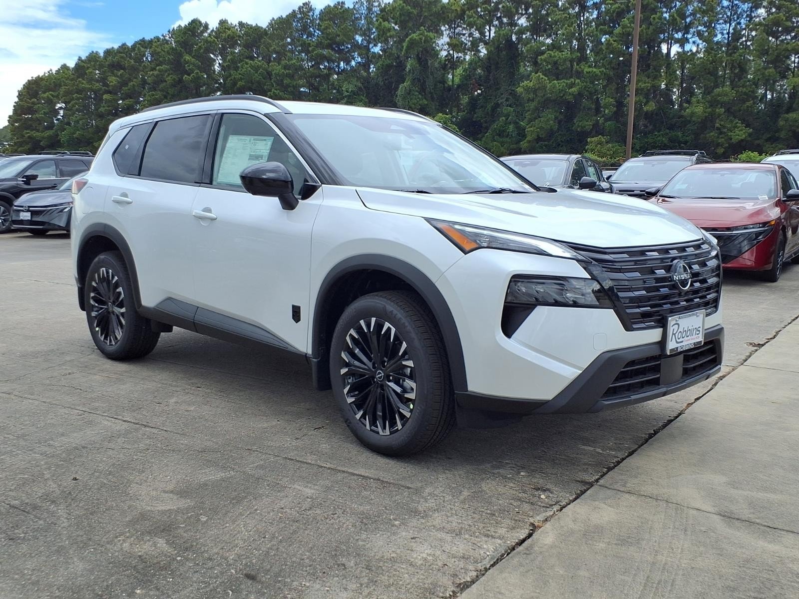 2026 Nissan Rogue Dark Armor™ White at Robbins Nissan