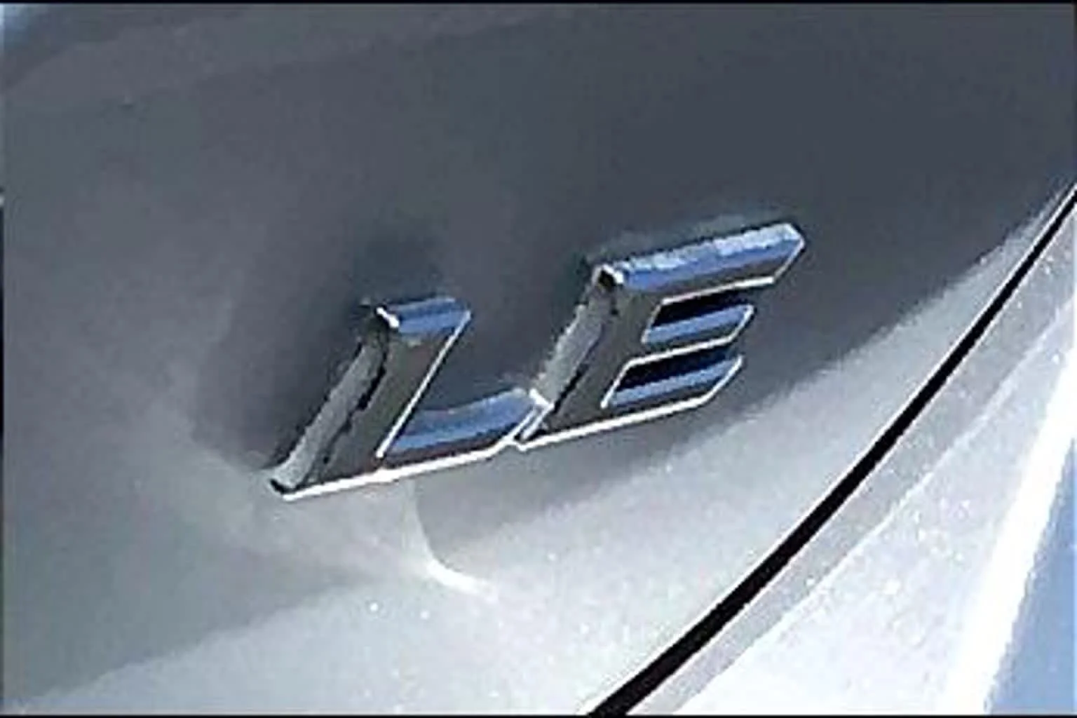 Used 2022 Celestial Silver Metallic Toyota LE image 9