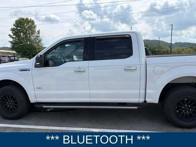 Used 2015 White Ford XLT image 1