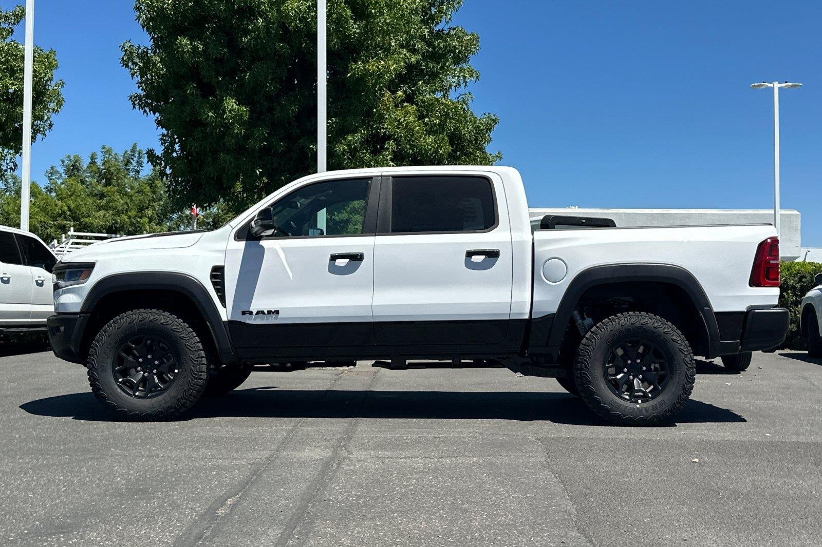 New 2026 Bright White Clearcoat Ram RHO image 7