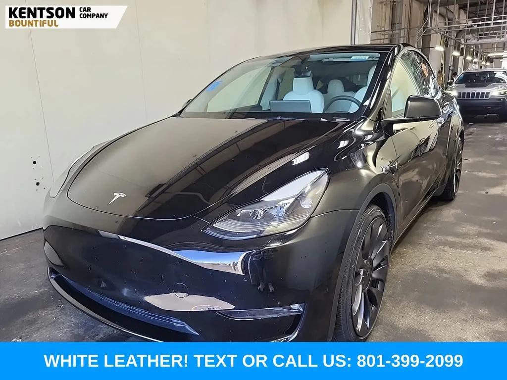 Used 2024 Black Tesla Performance image 1