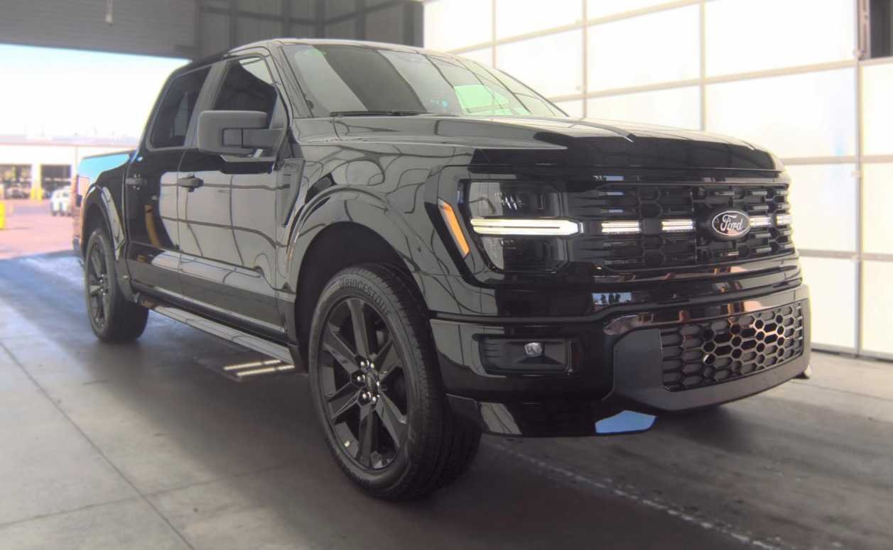 Used 2025 Agate Black Metallic Ford STX image 2