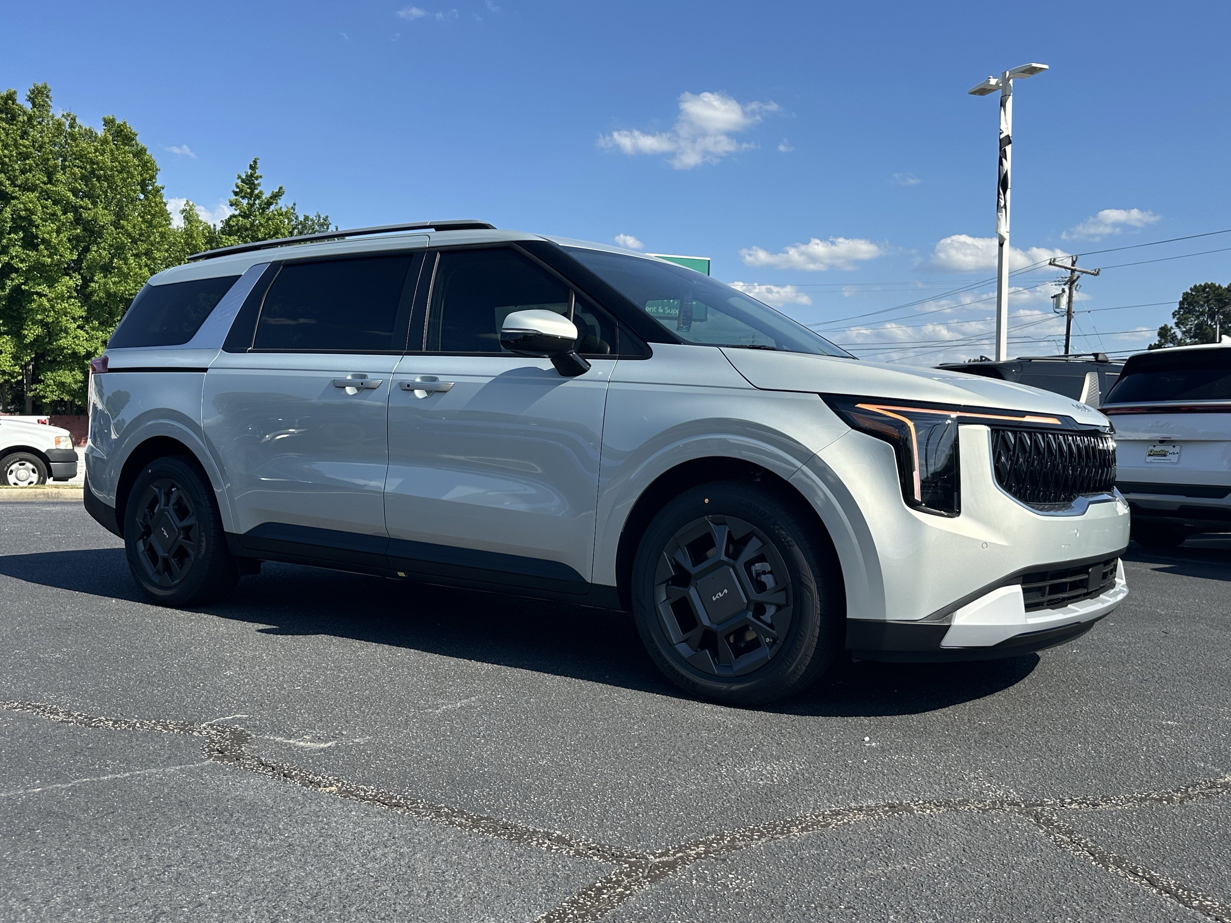 New 2026 Ivory Silver Kia EX image 2