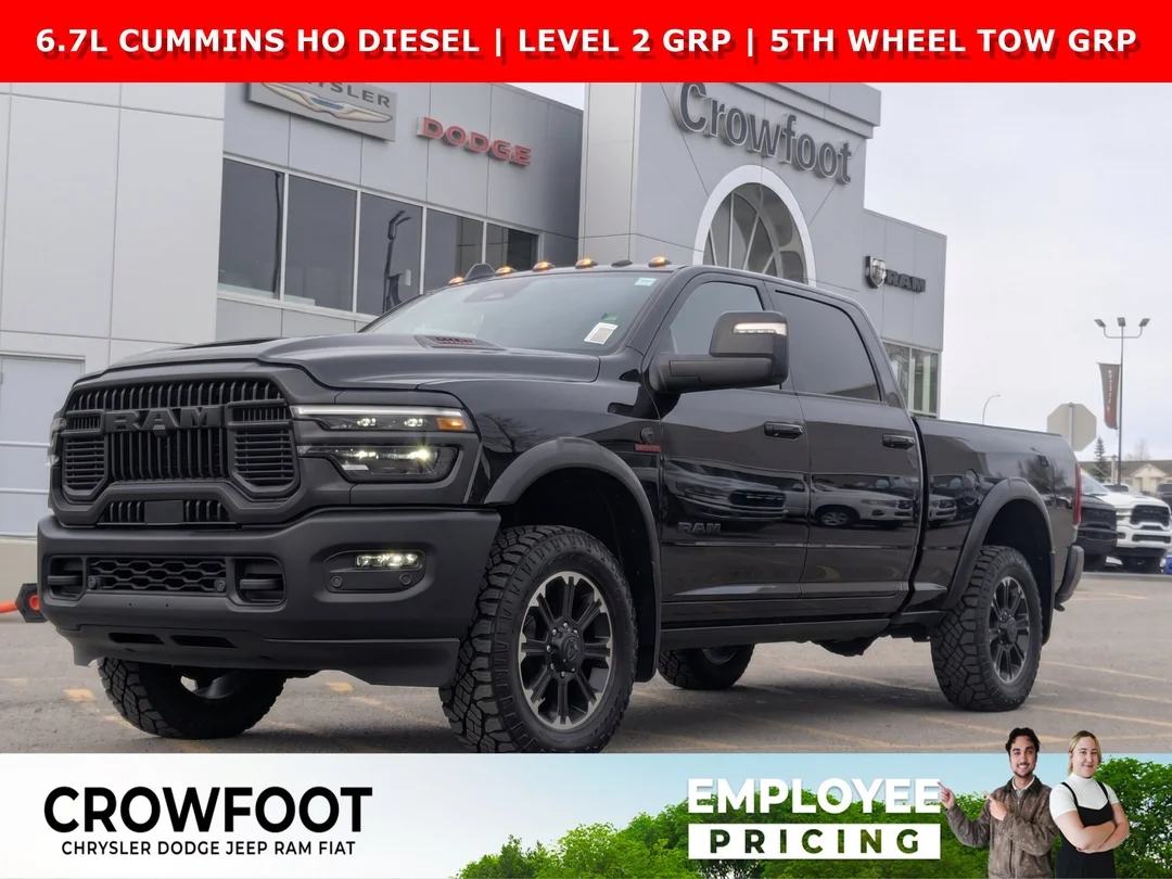 New 2026 Black RAM Rebel - - 6.7L Cummins HO - Rebel Lvl 2 Grp - Rear Air Susp - 5th Wheel/Gooseneck Prep & More! image 1