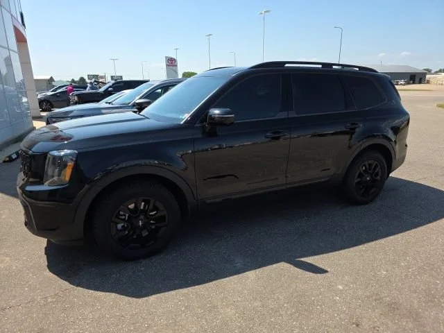 Used 2024 Ebony Black Kia SX X-Pro image 4