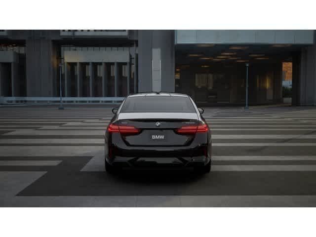 New 2027 Black Sapphire Metallic BMW 550e xDrive image 5