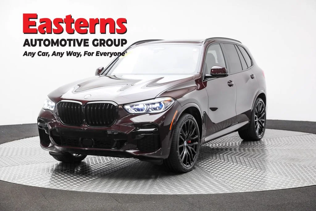 Used 2022 Red BMW M50i image 1