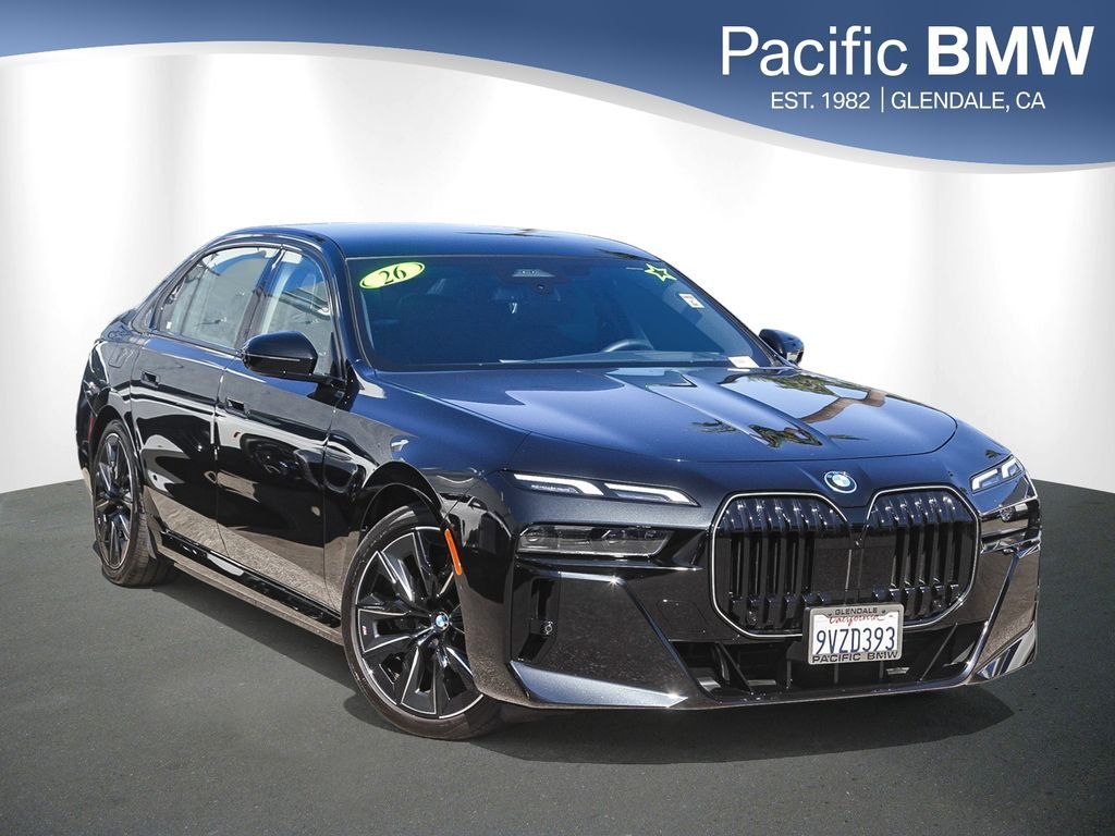 Used 2026 Black Sapphire Metallic BMW 750e xDrive image 1