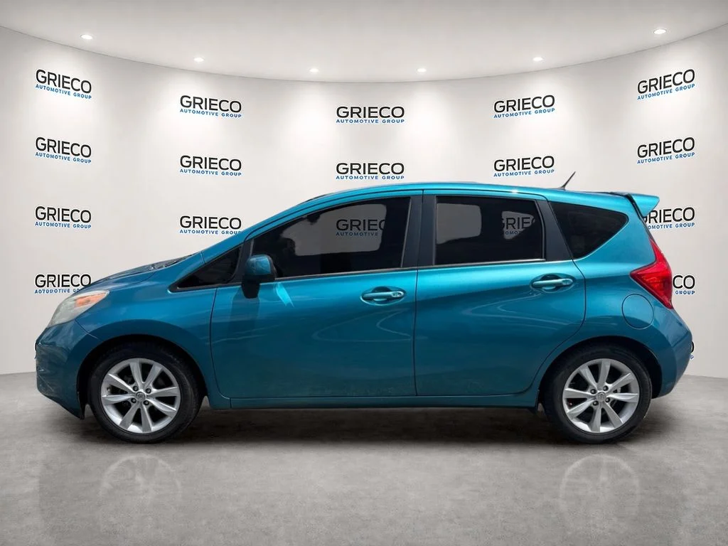 Used 2014 Metallic Peacock Nissan SV image 4
