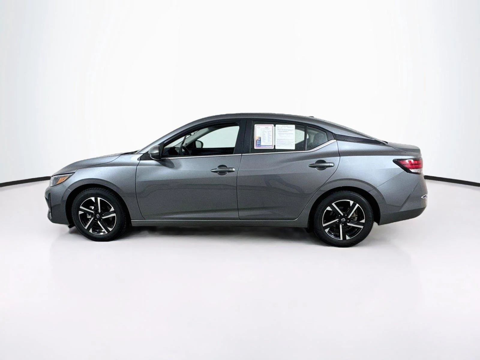 Used 2024 Gun Metallic Nissan SV image 3