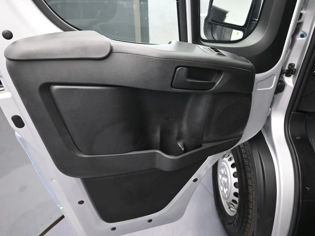 Used 2025 Bright Silver Clearcoat Metallic Ram Low Roof image 15
