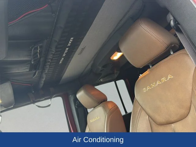 Used 2013 Red Jeep Unlimited Sahara image 13