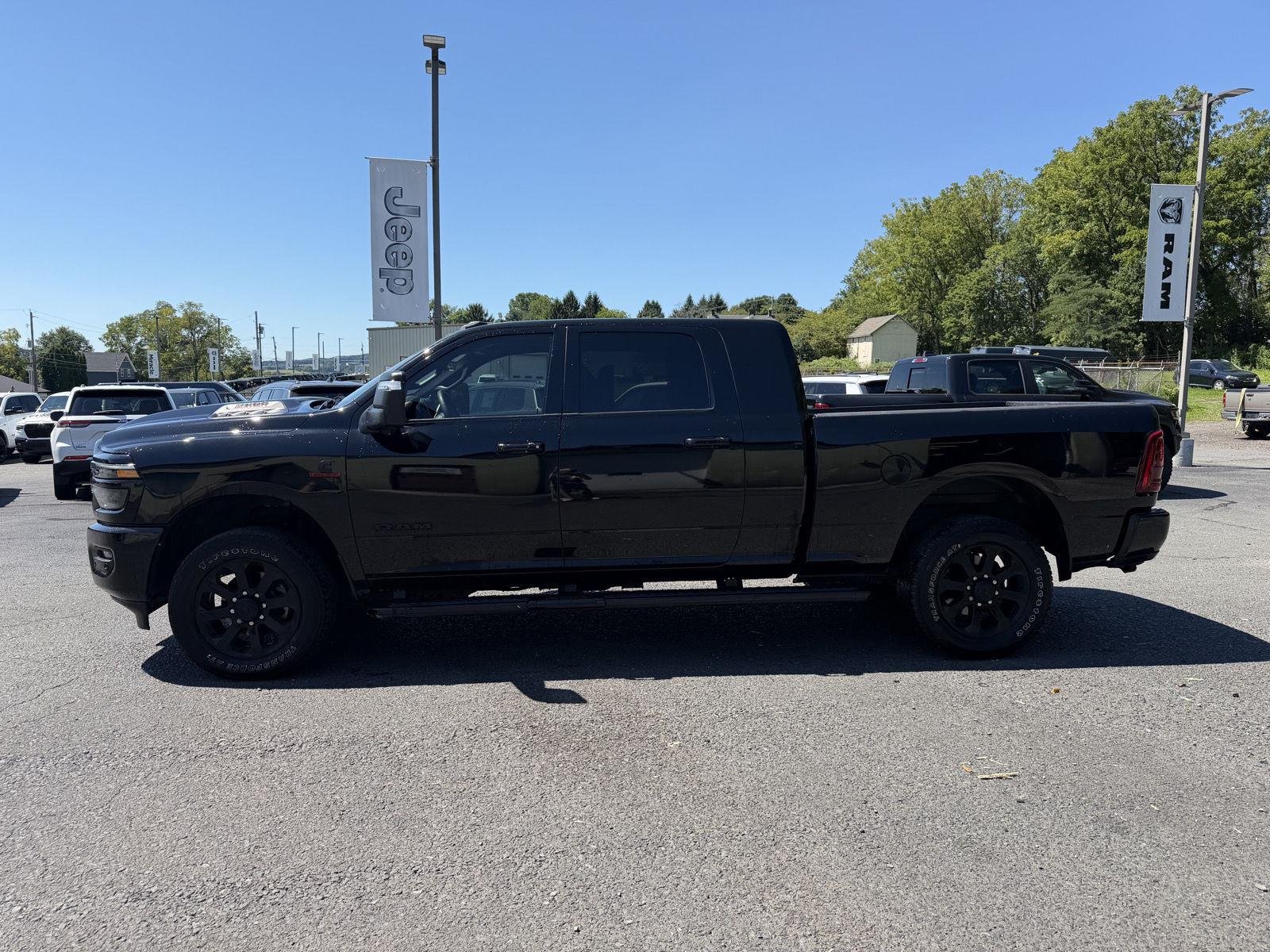 Used 2025 Diamond Black Crystal Pearlcoat Ram Laramie image 4