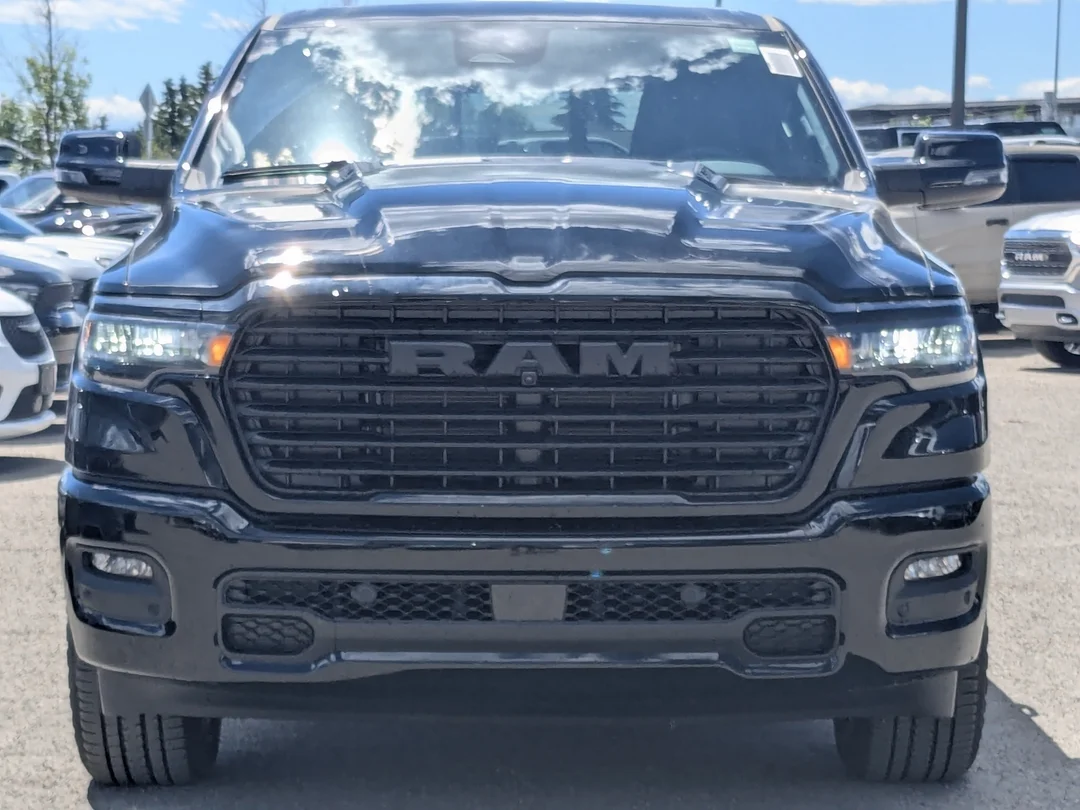 New 2026 Black RAM Sport - - 3.0L Hurricane Twin Turbo - Pano Sunroof - Sport Perf Hood - Trailer Brake & More! image 3