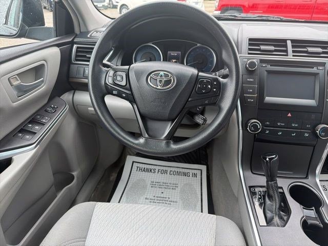 Used 2016 Midnight Black Metallic Toyota LE image 21