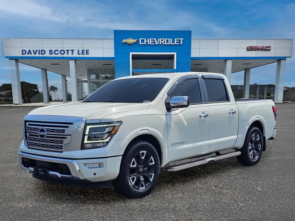 Used 2024 Pearl White Trico Nissan Platinum Reserve image 1