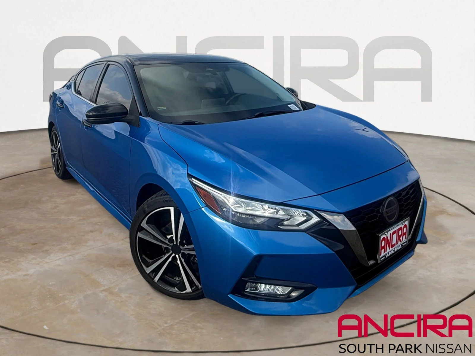 Used 2021 Electric Blue/Super Black Nissan SR image 1