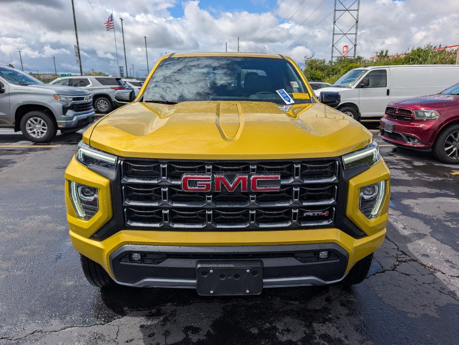 Used 2023 Solar Flare Metallic GMC 4WD AT4 image 2