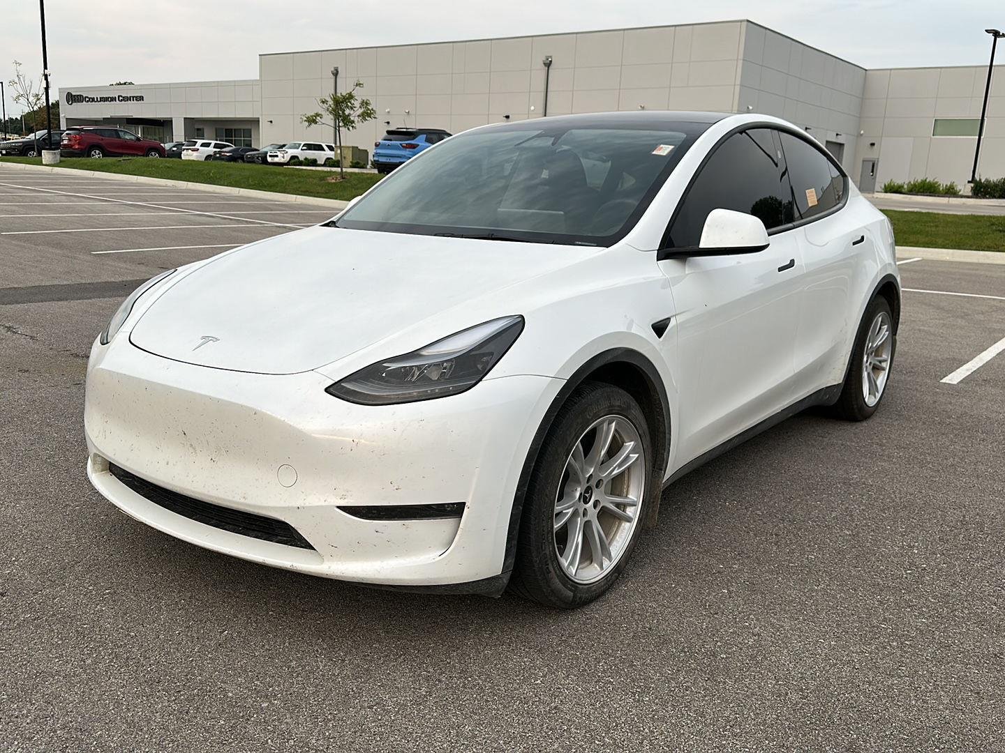 Used 2024 Tesla Model Y Long Range with VIN 7SAYGDEEXRA284777 for sale in Saint Joseph, MO