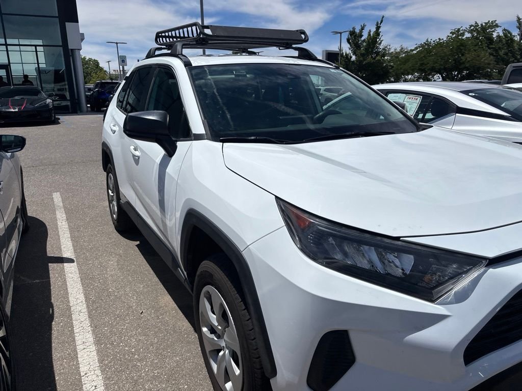 Used 2021 White Toyota LE image 1