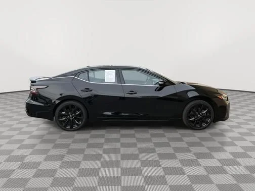 Certified Used 2023 Black Nissan SR image 2
