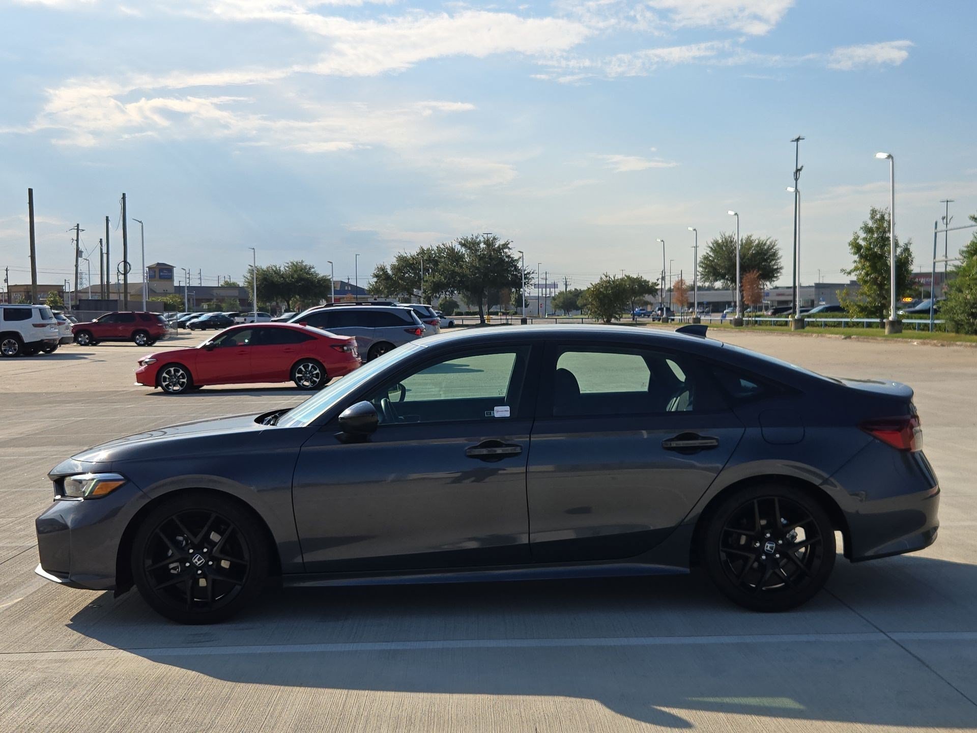 Certified Used 2025 Meteorite Gray Metallic Honda 4D SPORT image 6