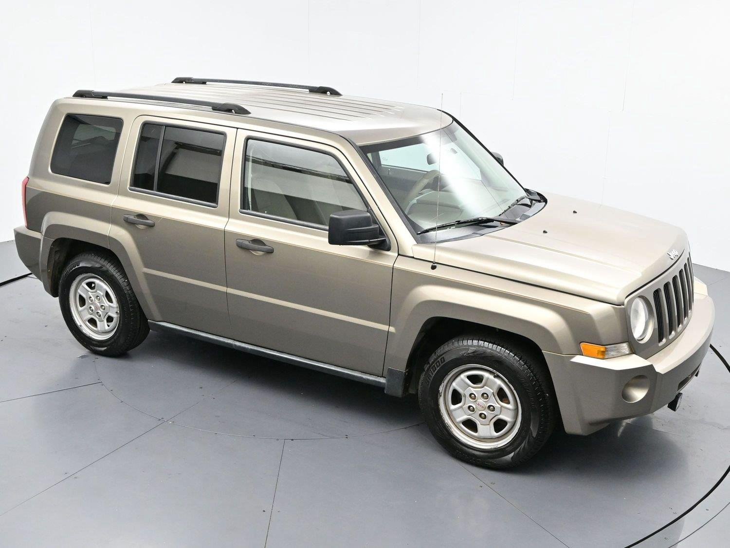 Used 2008 Light Khaki Metallic Jeep Sport image 32