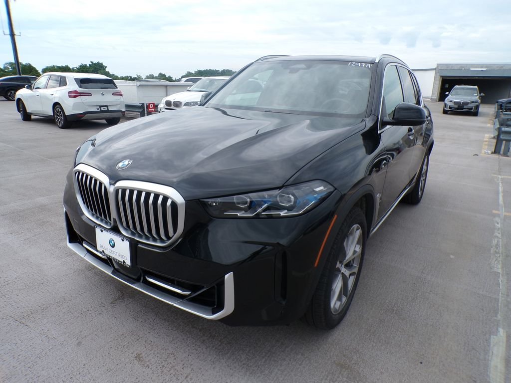 Certified Used 2024 Black Sapphire Metallic BMW xDrive40i image 3