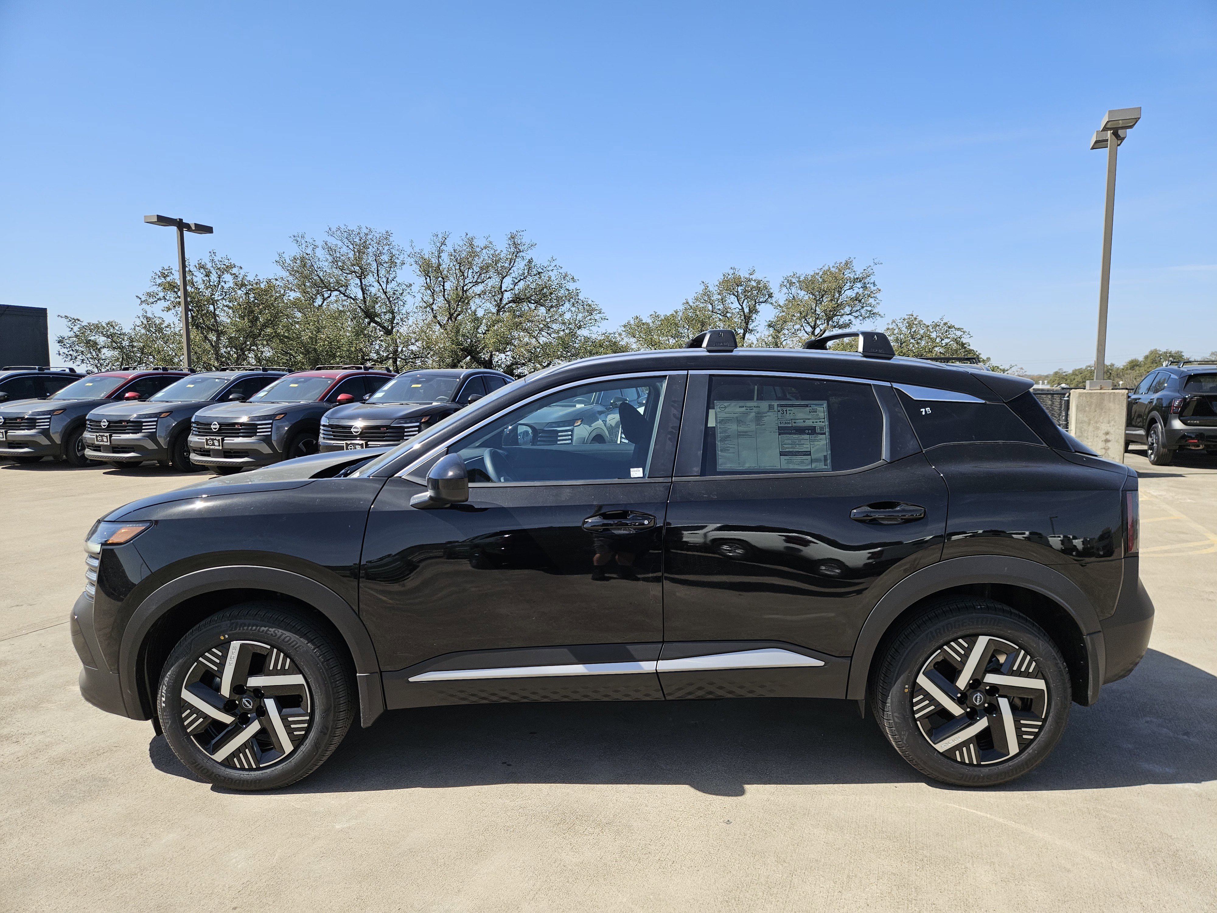 New 2026 Super Black Nissan SV image 4