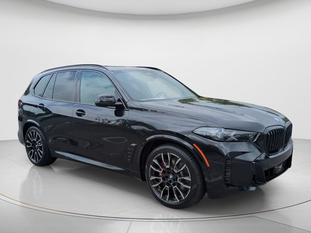 New 2026 Black Sapphire Metallic BMW xDrive50e image 7