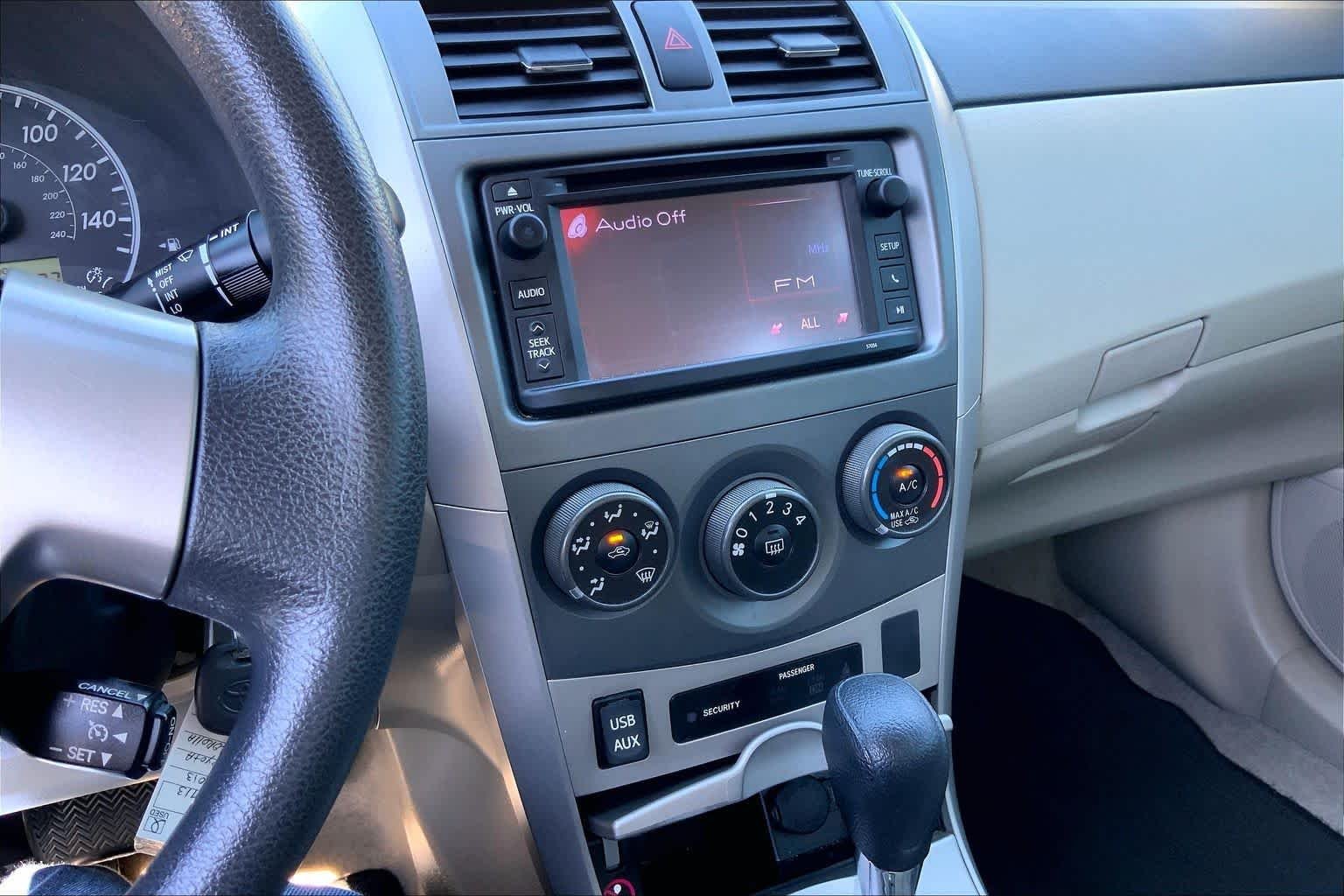Used 2013 Tropical Sea Metallic Toyota LE image 7
