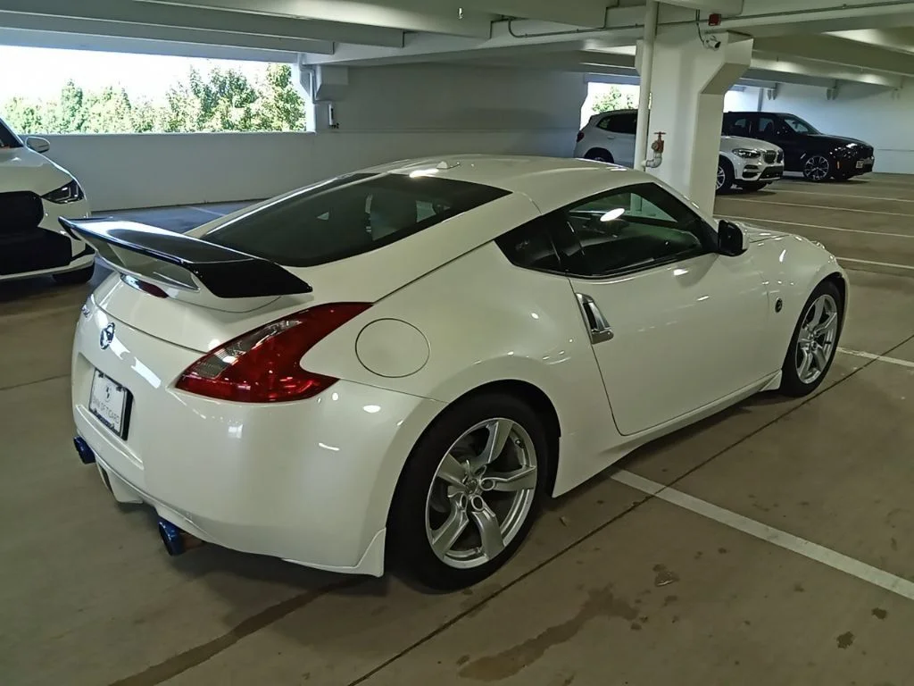 Used 2010 Pearl White Nissan Touring image 5