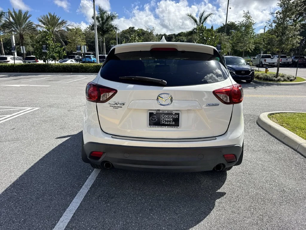 Used 2015 Mazda CX-5 Grand Touring with VIN JM3KE2DY0F0539059 for sale in Coconut Creek, FL