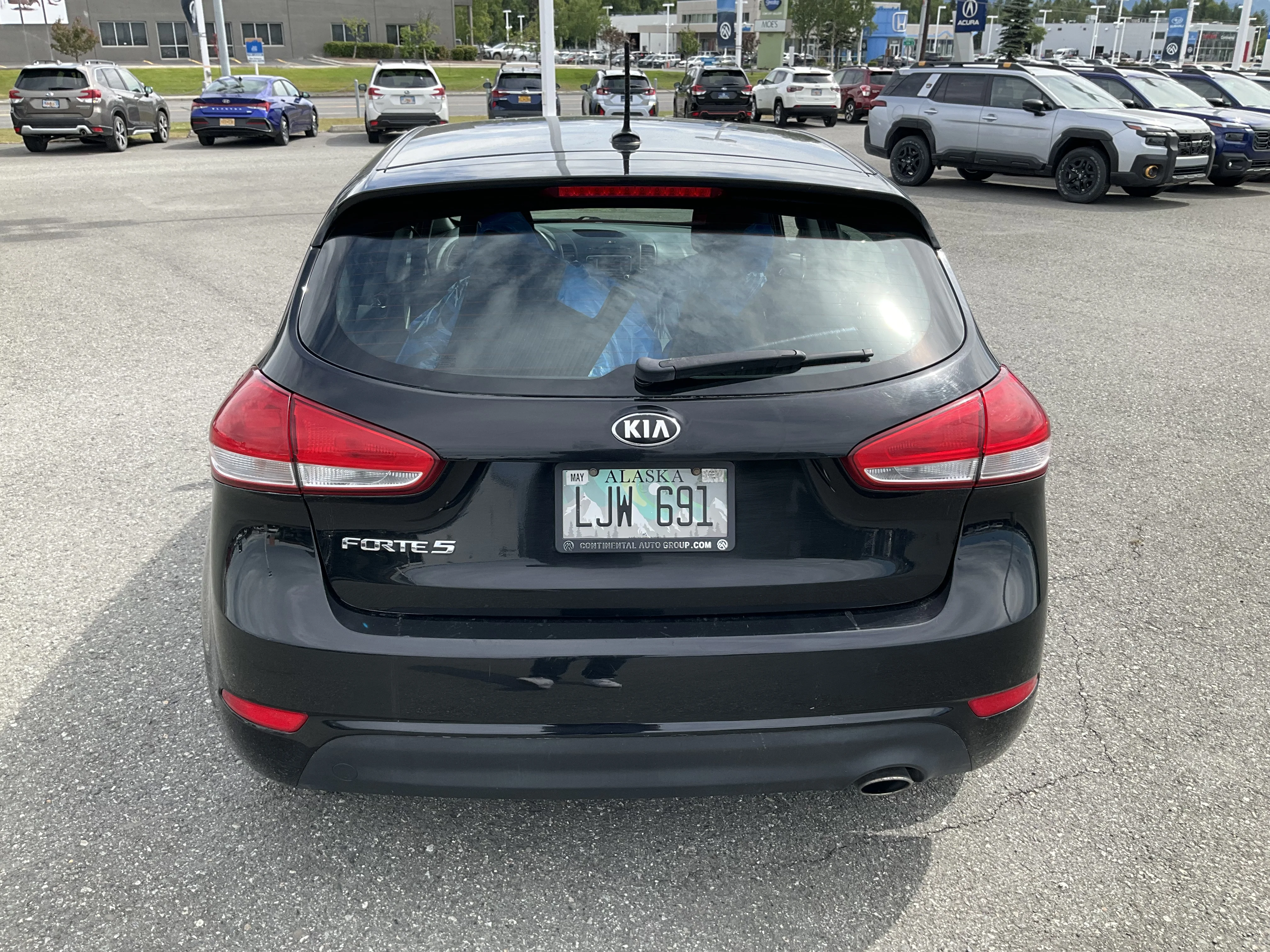 Used 2016 Aurora Black Pearl Kia LX image 4