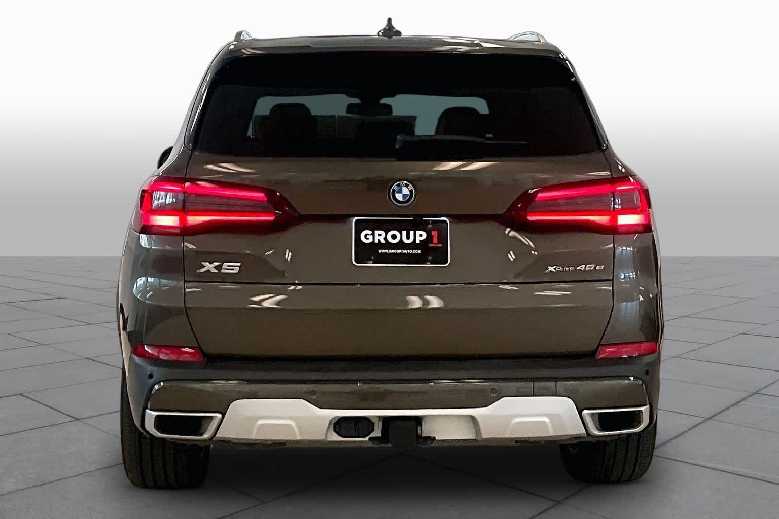 Used 2023 Manhattan Green Metallic BMW xDrive45e image 4