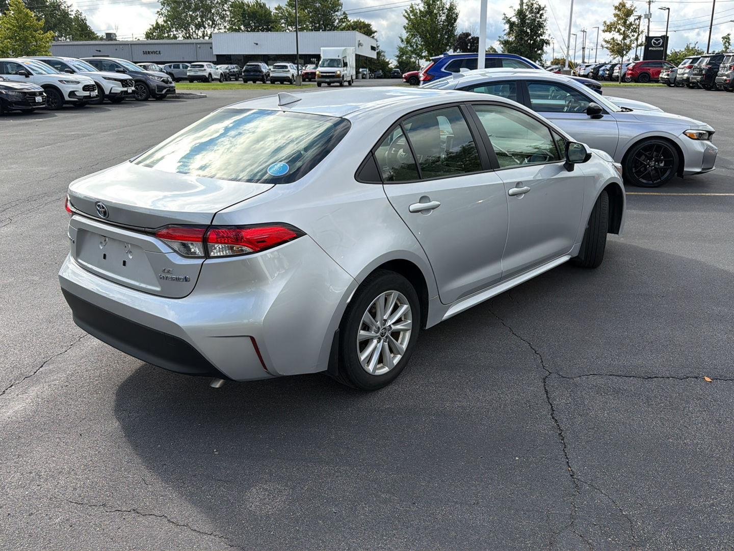 Used 2024 Classic Silver Metallic Toyota Hybrid LE image 7