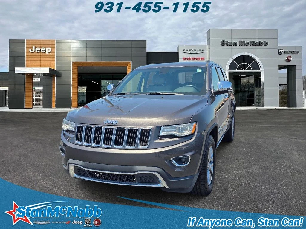 Used 2015 Granite Crystal Metallic Clearcoat Jeep Limited image 1