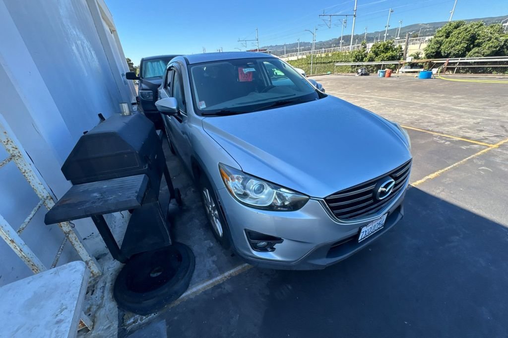 Used 2016 Mazda CX-5 Touring with VIN JM3KE2CY4G0618611 for sale in San Bruno, CA