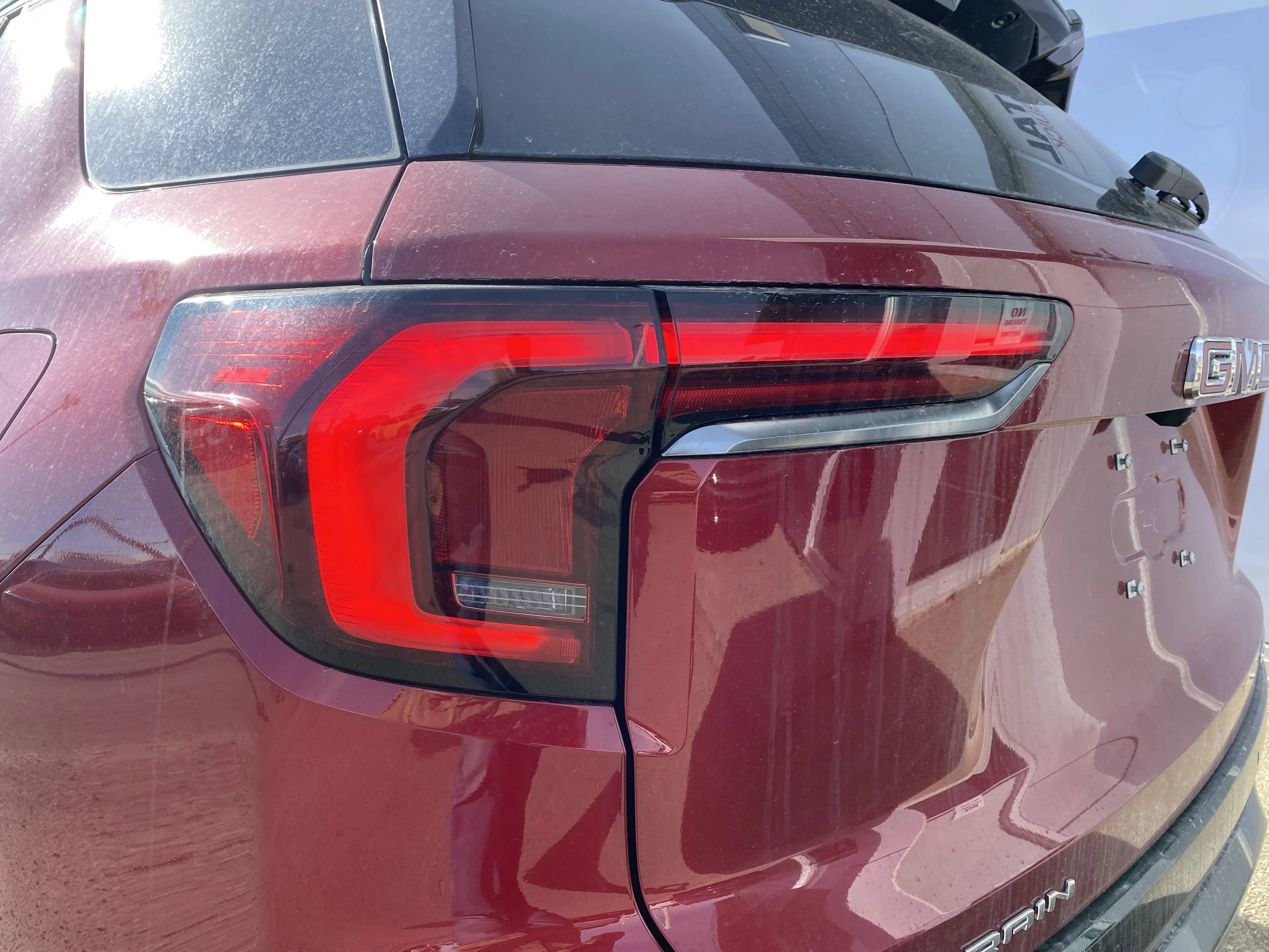 New 2026 VOLCANIC RED TINTCOAT GMC AWD AT4 image 11