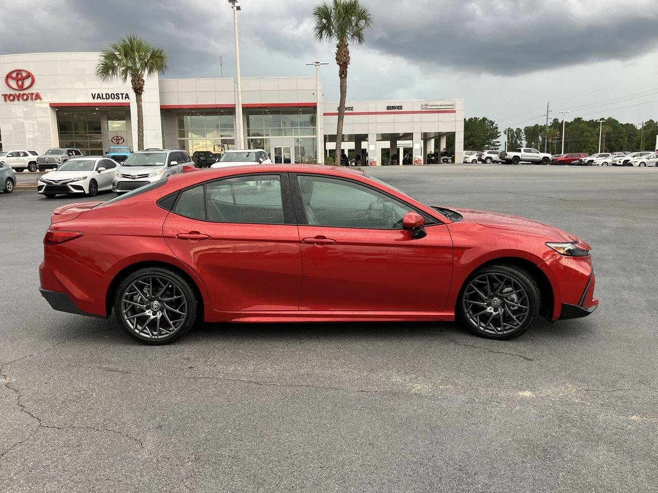 Used 2025 Red (Supersonic Red) Toyota SE image 6