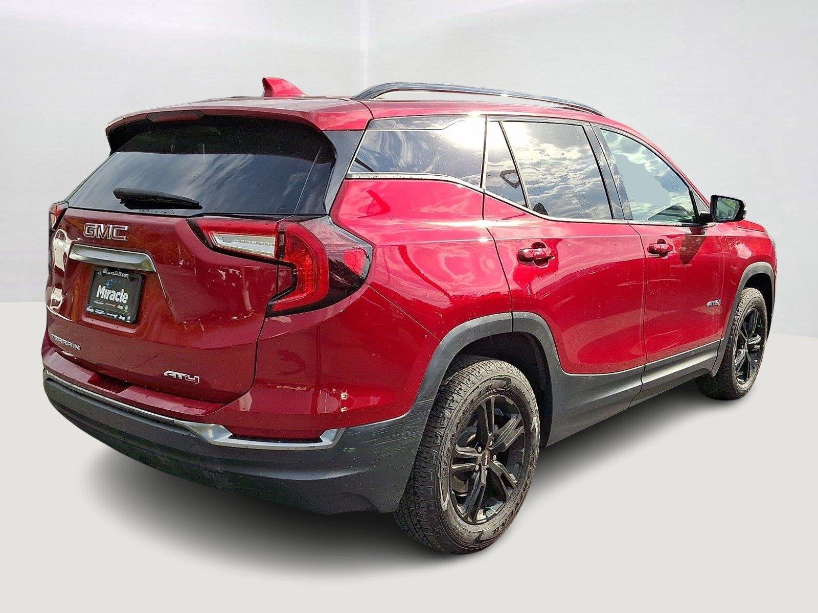 Used 2023 Volcanic Red Tintcoat GMC AT4 image 6