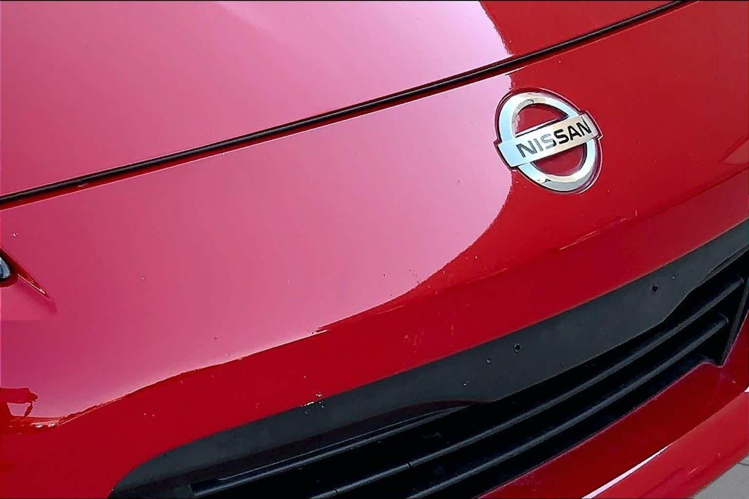 Used 2016 Solid Red Nissan Touring image 30