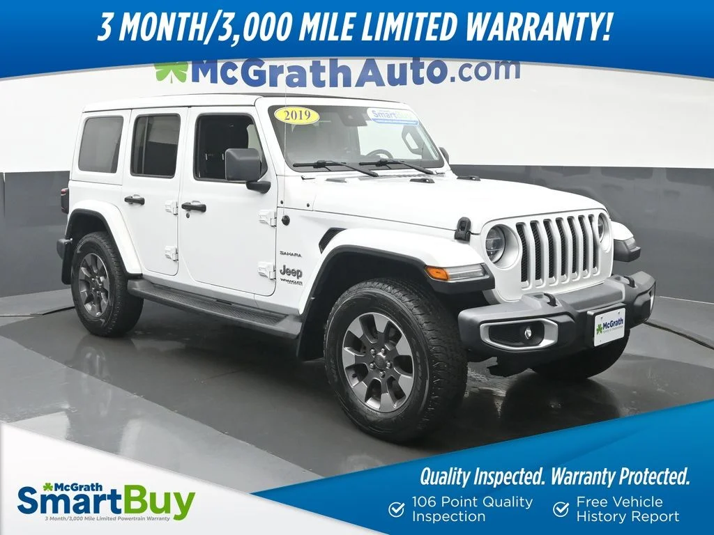 Used 2019 White Jeep Unlimited Sahara image 1