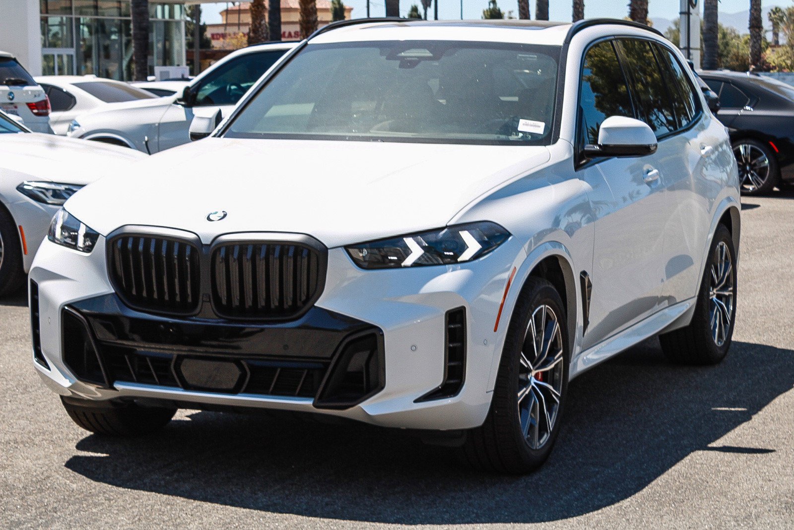 Used 2024 Mineral White Metallic BMW xDrive40i image 3