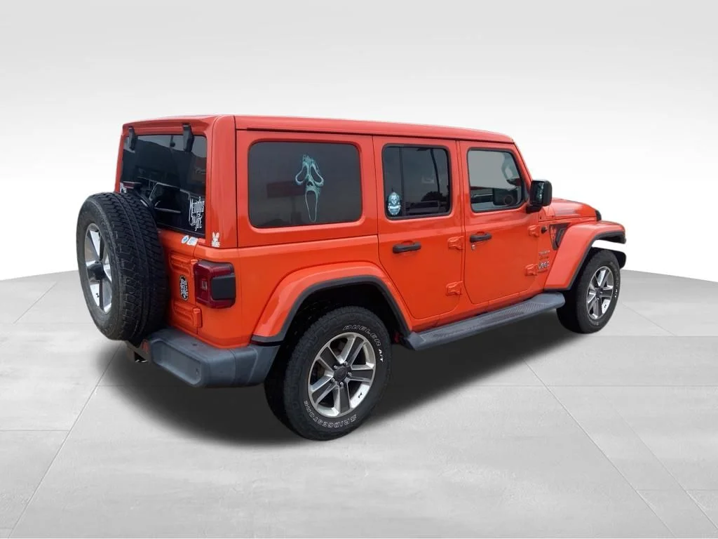 Used 2019 Orange Jeep Unlimited Sahara image 14