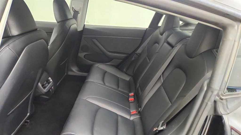 Used 2023 Solid Black Tesla RWD image 25