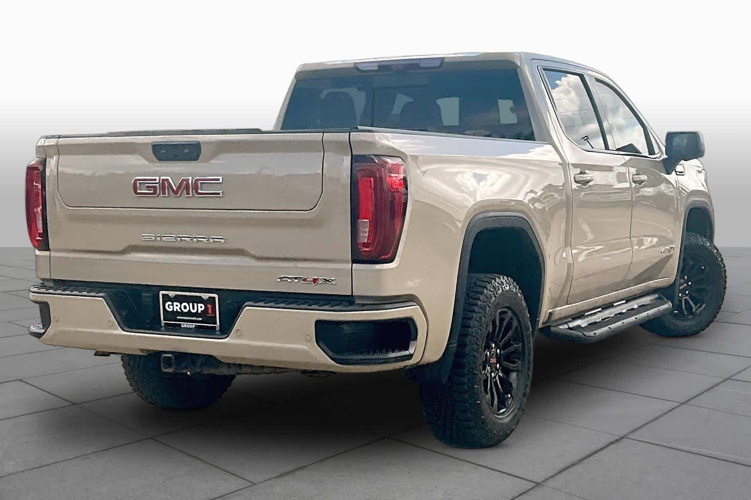Used 2022 Desert Sand Metallic GMC AT4X image 13